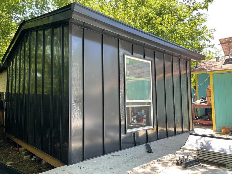 Black standing seam metal wall panels for Roof Inspection in Barre