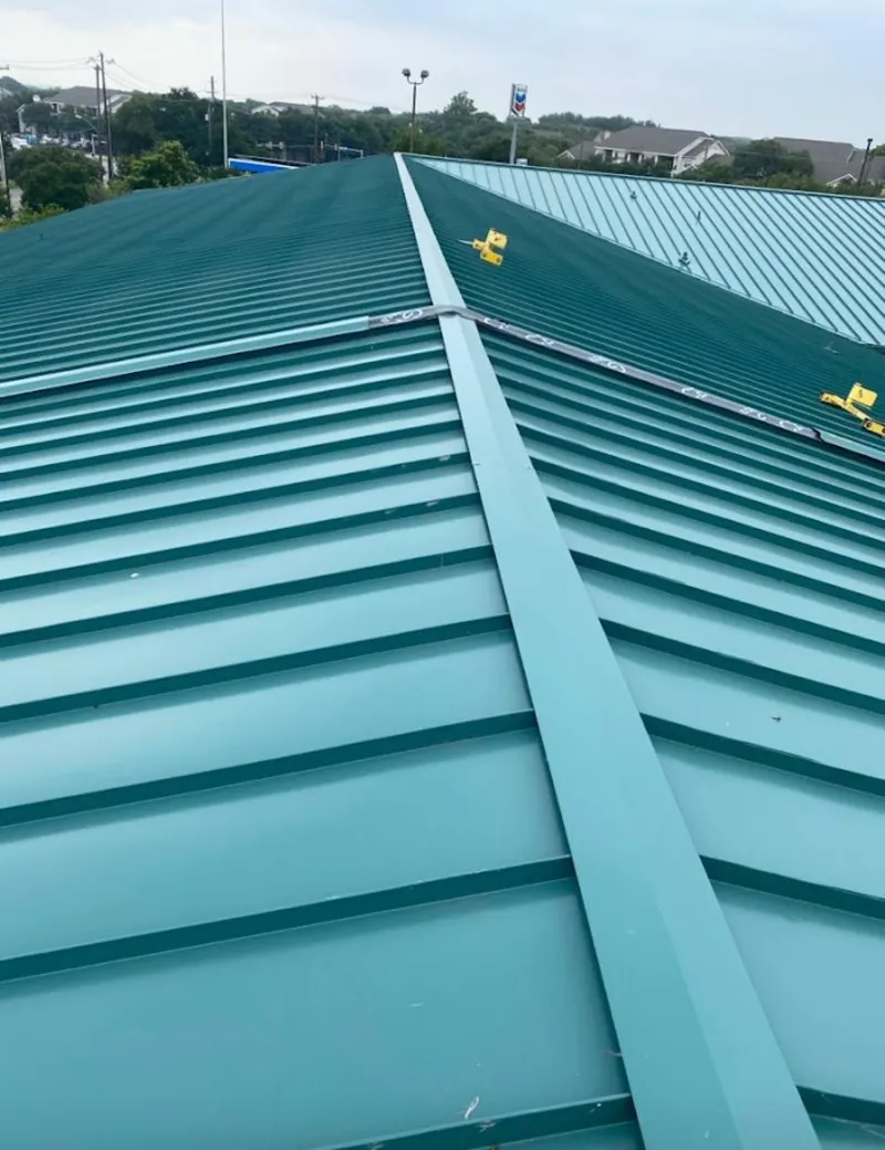 Green commercial metal roof ridge and valley for Metal Roof Repair in Barre